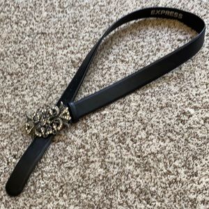 Leather belt with stone embellished buckle.